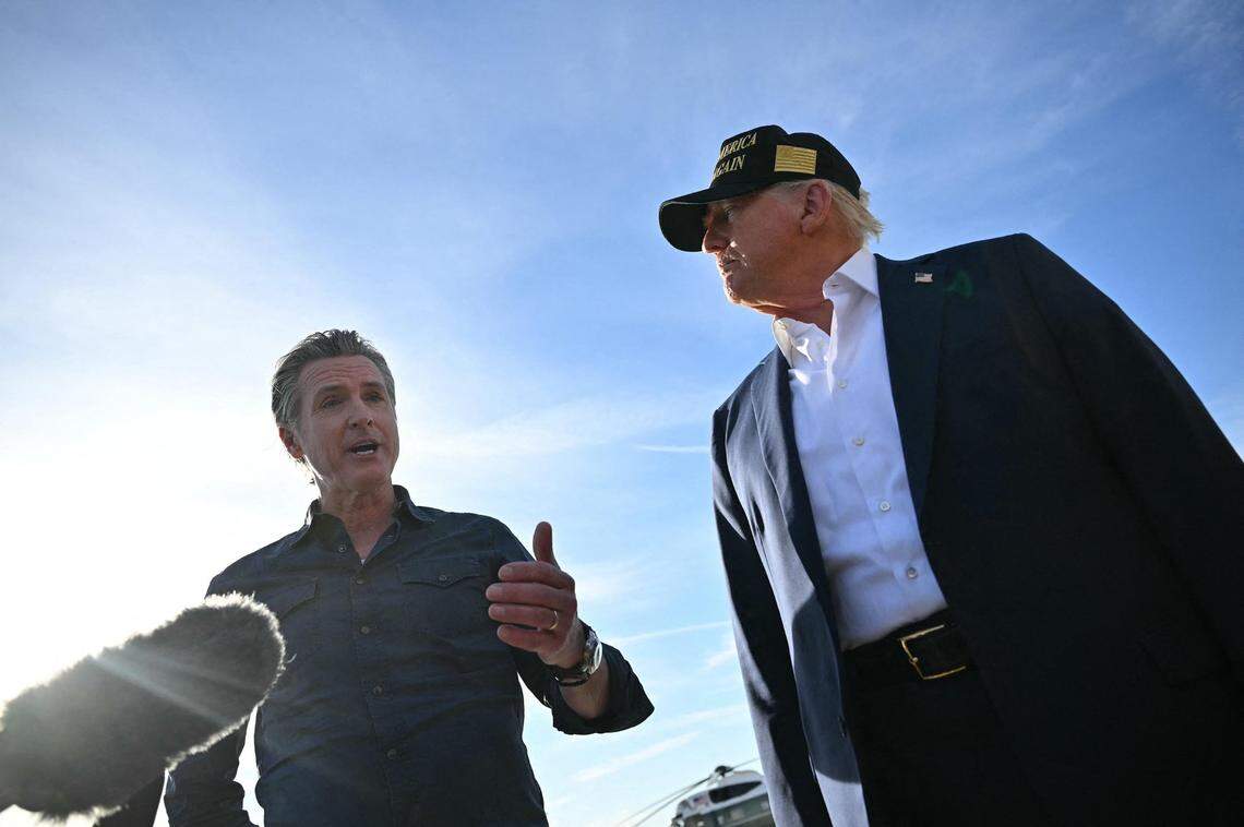 President Donald Trump, right, and Gov. Gavin Newsom speak to the media upon arrival at Los Angeles International Airport in Los Angeles on Friday.