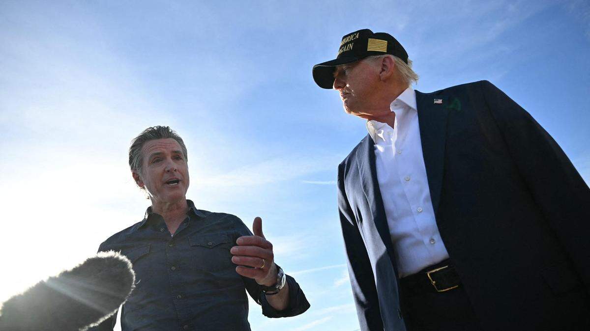 President Donald Trump, right, and Gov. Gavin Newsom speak to the media upon arrival at Los Angeles International Airport in Los Angeles on Friday, Jan. 24, 2025.