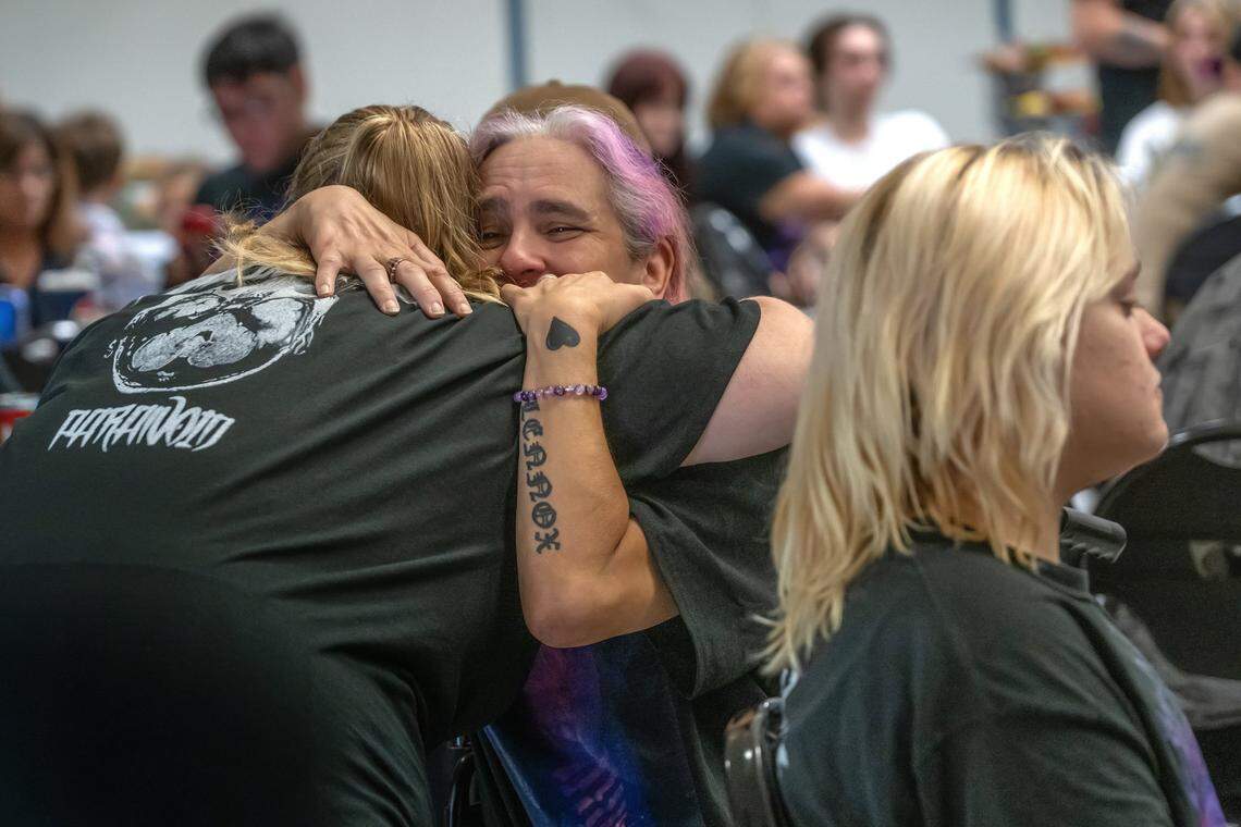 Shawn Jordan’s mother Marie Martinez is hugged at a celebration of life memorial for him on July 28. Jordan died in June when he was hit by a car in Citrus Heights.