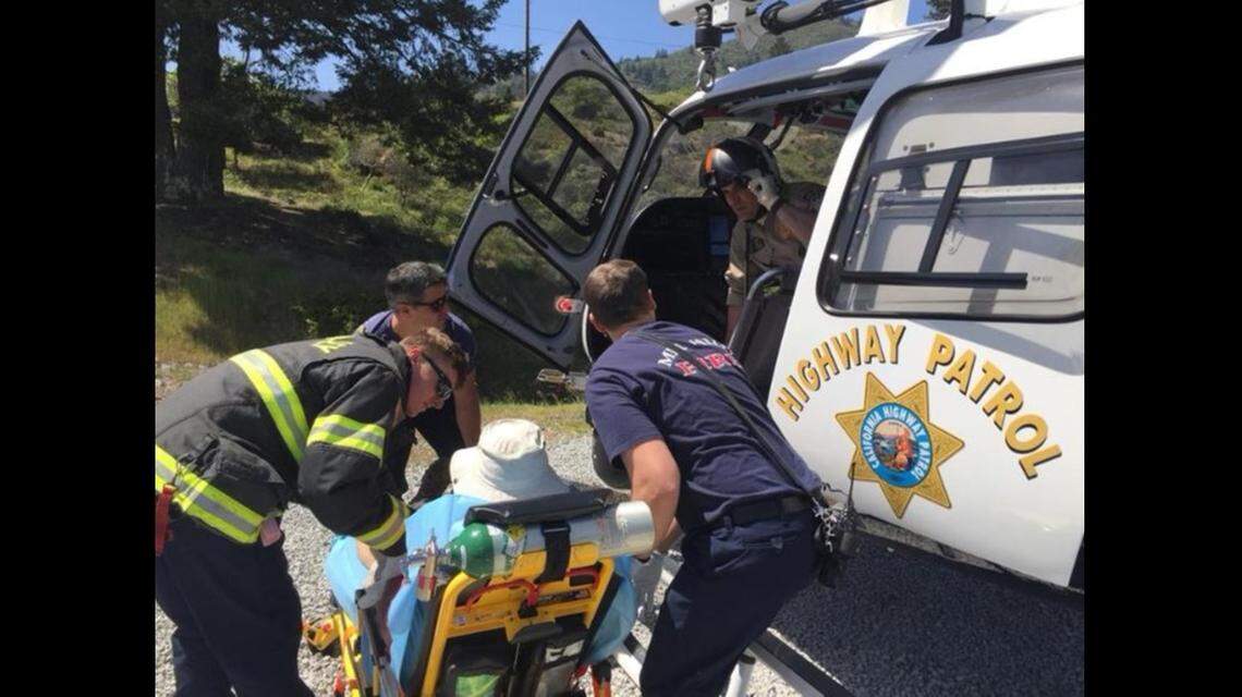 A California Highway Patrol helicopter prepares to airlift a 79-year-old man who suffered several rattlesnake bites Sunday hiking on Mt. Tamalpais in the Bay Area.