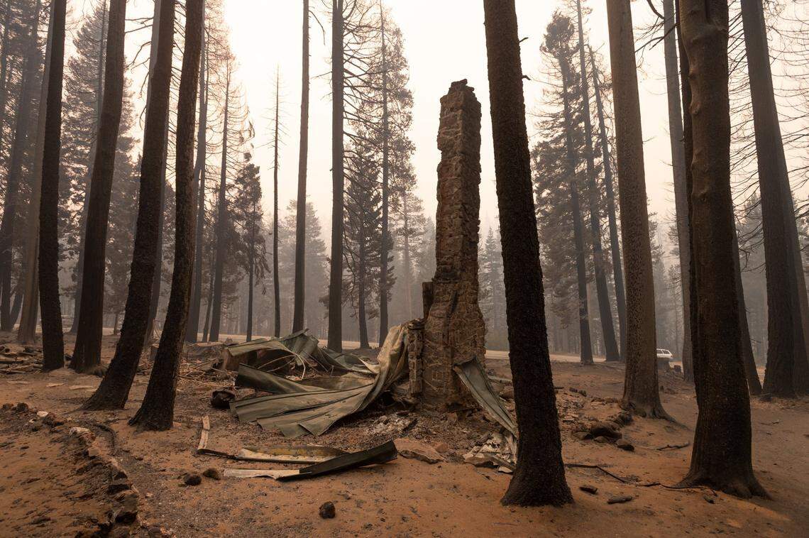 The chimney remains of a home along Highway 50 in the Eldorado National Forest on Monday, Aug. 30, 2021, after the Caldor Fire burned through the area.