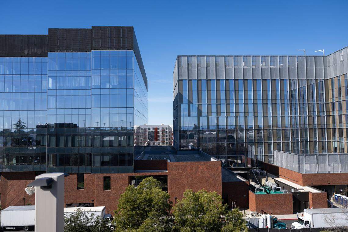 300 Aggie Square, left, and 200 Aggie Square, right, the first two buildings of the Aggie Square project, are nearing completion on Thursday, Feb. 20, 2025. 