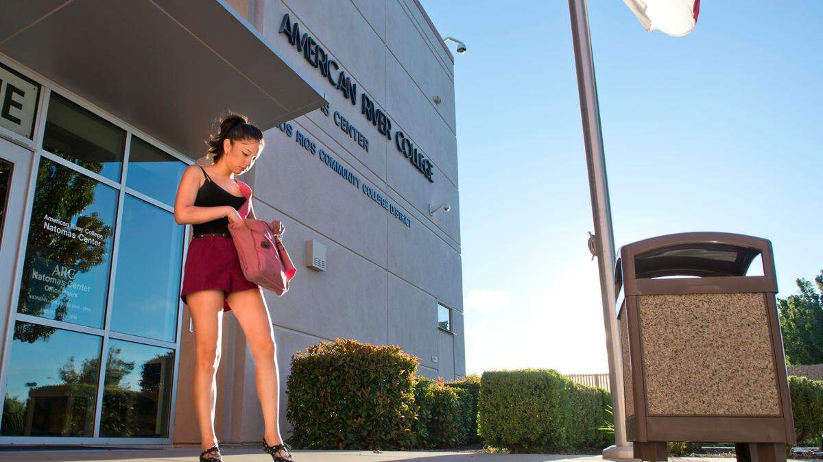 Ivania Areas, 18, of Natomas waits for the doors to open at the American River College Natomas Center in 2013. ARC has begun offering many online and hybrid programs since the start of the pandemic.