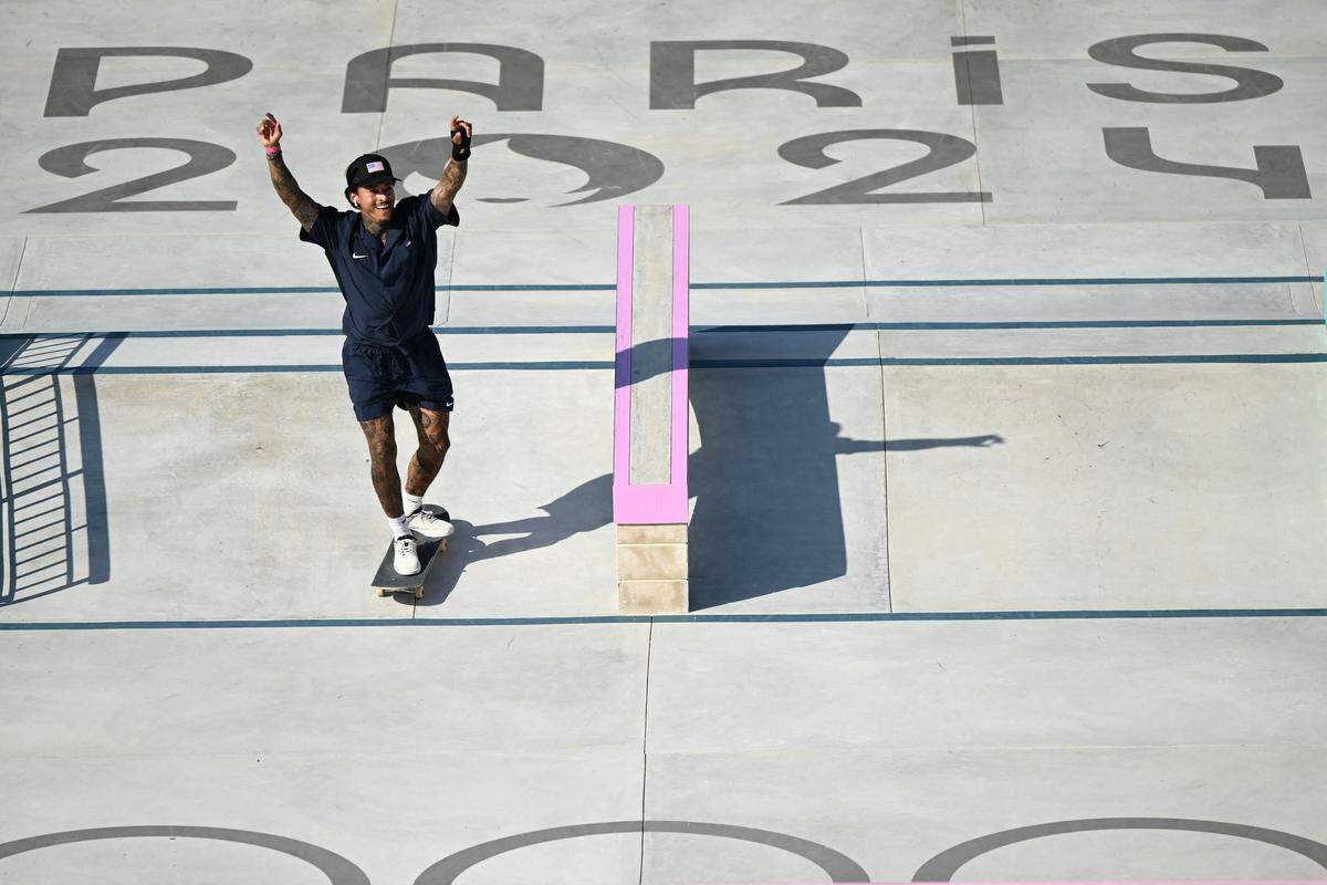 US' Nyjah Huston competes in the men's street skateboarding final during the Paris 2024 Olympic Games at La Concorde in Paris on July 29, 2024. (Photo by Kirill KUDRYAVTSEV / AFP) (Photo by KIRILL KUDRYAVTSEV/AFP via Getty Images)