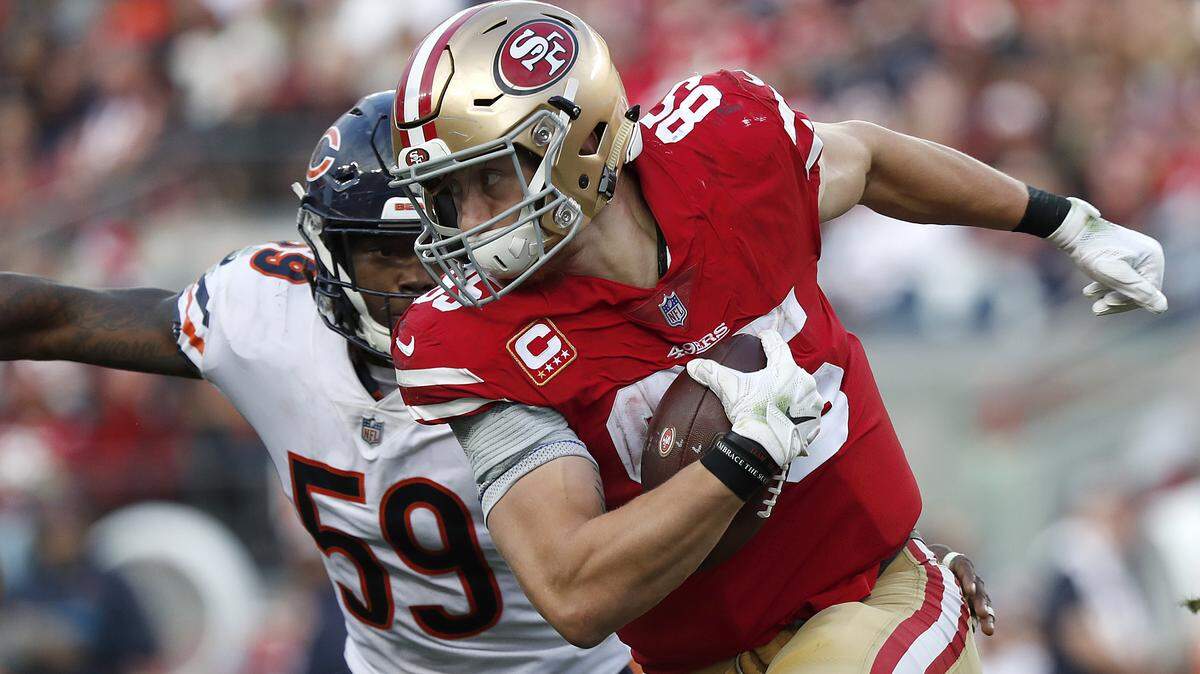 San Francisco 49ers tight end George Kittle (85) looks for room to run as Chicago Bears inside linebacker Danny Trevathan (59) chases on Sunday, Dec. 23, 2018, at Levi’s Stadium. The 49ers lost 14-9.