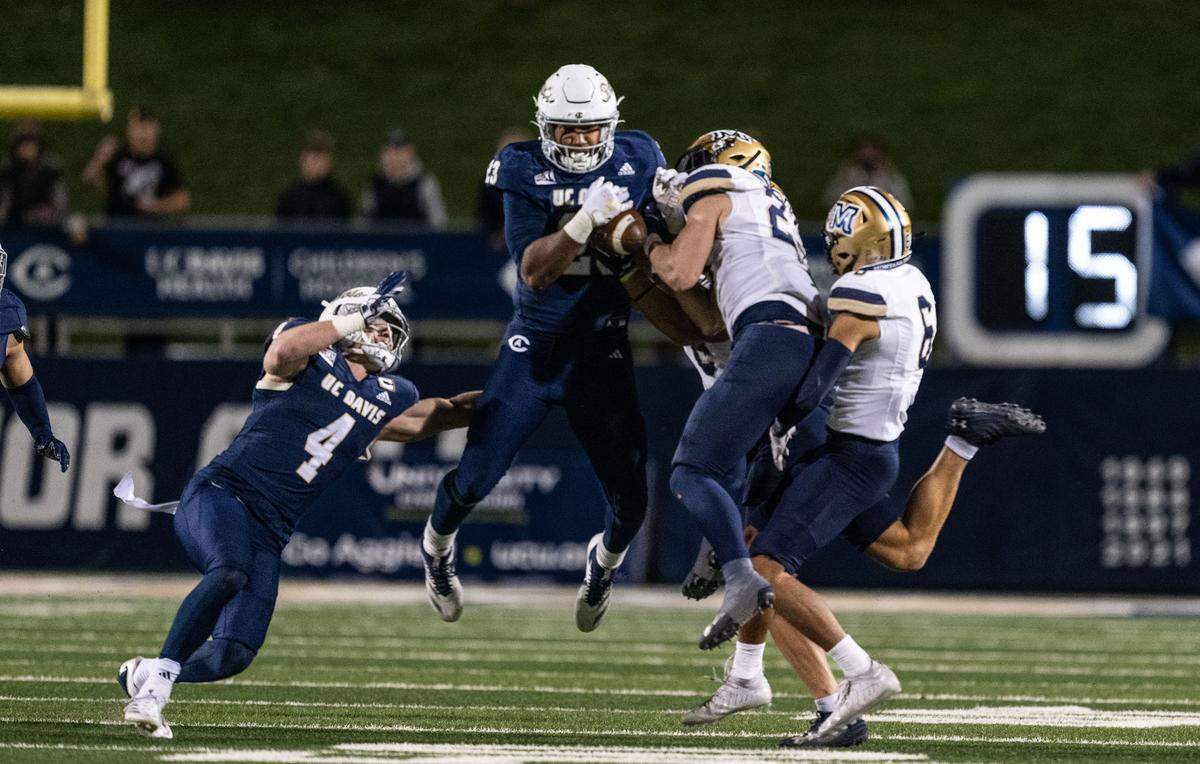 UC Davis Aggies tight end Winston Williams (23) recovers an onside kick against the Montana State Bobcats in the fourth quarter during a NCAA football game on Saturday, Nov. 16, 2024, at UC Davis Health Stadium. 