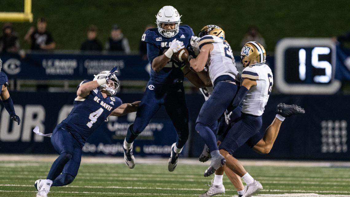 UC Davis Aggies tight end Winston Williams (23) recovers an onside kick against the Montana State Bobcats in the fourth quarter on Saturday as his attempts a late comeback. 