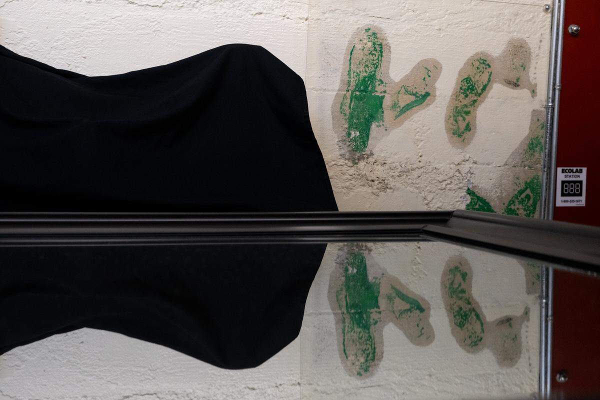 The restored shoe prints made by musician Kurt Cobain in the backstage room of the Crest Theatre earlier this month. The shoe prints had previously been painted over.