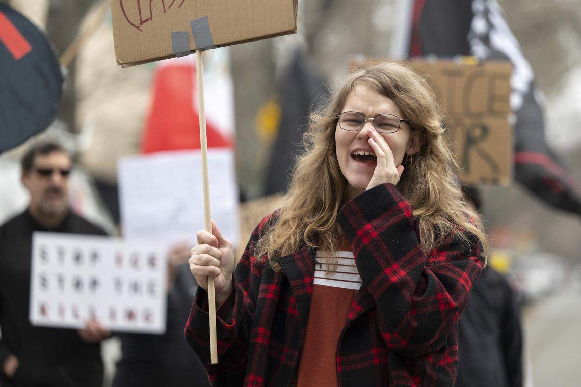 Lydia Raebel protests against Immigration and Customs Enforcement outside the John Moss Federal Building in Sacramento on Sunday.
