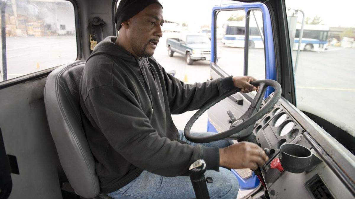 Ricky Gamble of Sacramento goes through a checklist of things that he will be tested on before taking a driving test to become a truck driver through Highlands Community Charter.