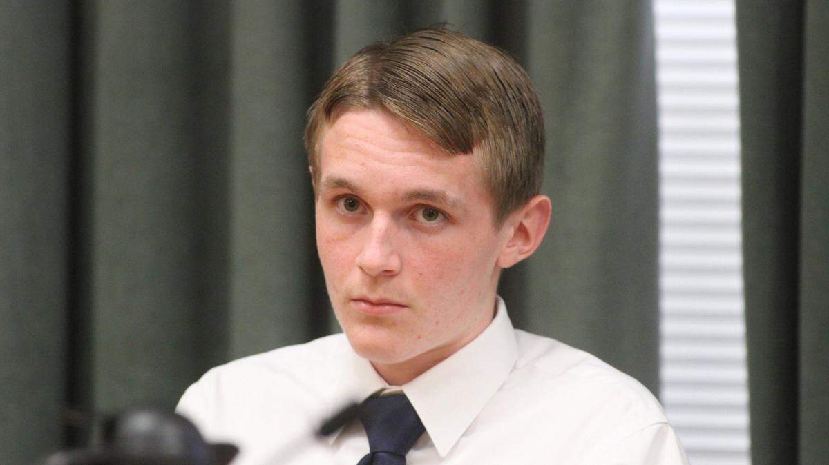 Daniel William Marsh; 17; watches as members of his family; the media and spectators enter the Yolo County Superior Court in Woodland on Tuesday; Sept. 30; 2014. Marsh; who was convicted the week prior of first-degree murder in the stabbings of an elderly Davis couple; was found to be sane at the time of the killings.
