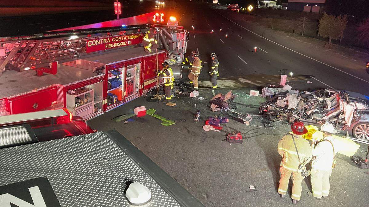 A Tesla hit a fire truck stopped on Interstate 680 near Walnut Creek, killing the driver, Californai firefighters say.
