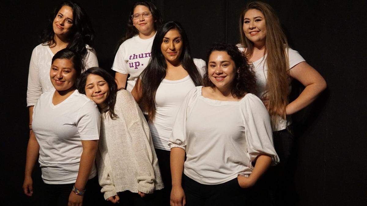 Teatro Espejo’s cast of Enfrascada poses for a portrait.