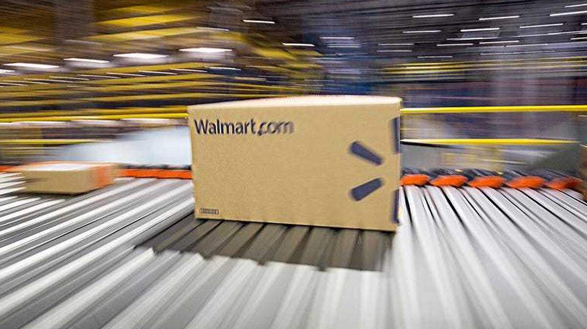A Walmart.com order speeds along a conveyor system at a fulfillment center in Florida in 2017. On Tuesday, May 23, 2023, California Attorney General Rob Bonta announced a settlement with the online retailer over third-party sales of brass knuckles, which are illegal in California.