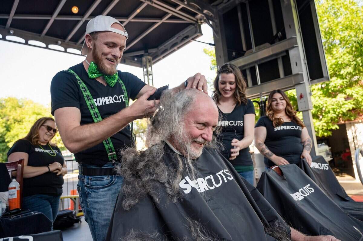 Cody Pendleton shaves restaurateur Patrick Mulvaney’s head during the St. Baldrick’s event Monday at Mulvaney’s B&L in midtown Sacramento.