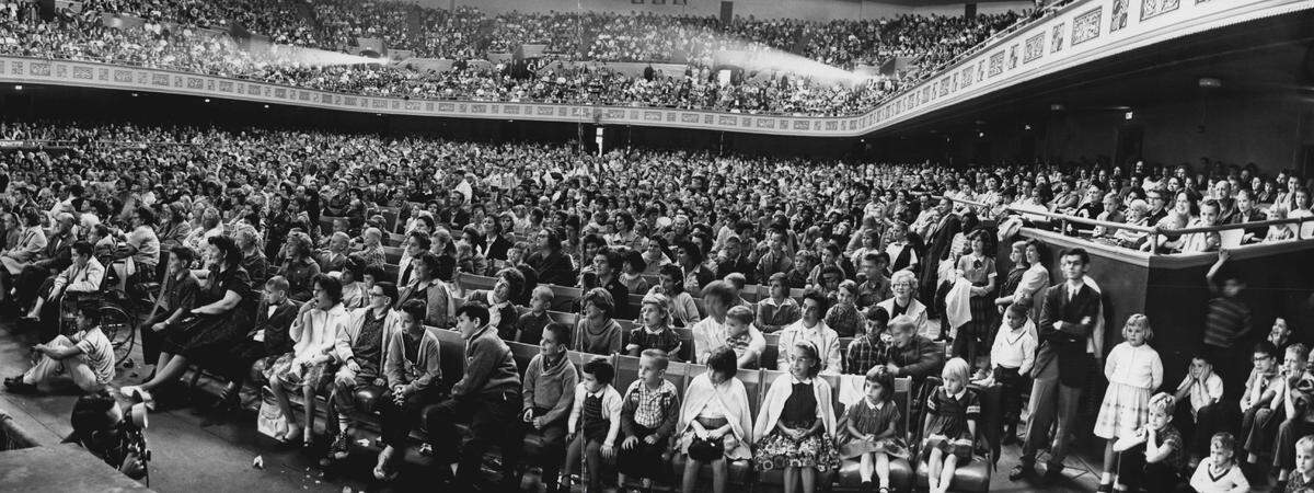 A full house packs the Sacramento Bee’s annual Christmas show, held in conjunction with its radio station KFBK, in 1962. The free event featured Santa Claus and vaudeville acts, including gold miners trying to remember which holiday was celebrated on Dec. 25. Other performers included a family of banjo players, “rolicking stars of dogdom” Leone’s Canines, a belling ringing act, juggling, acrobatics and a baby elephant.