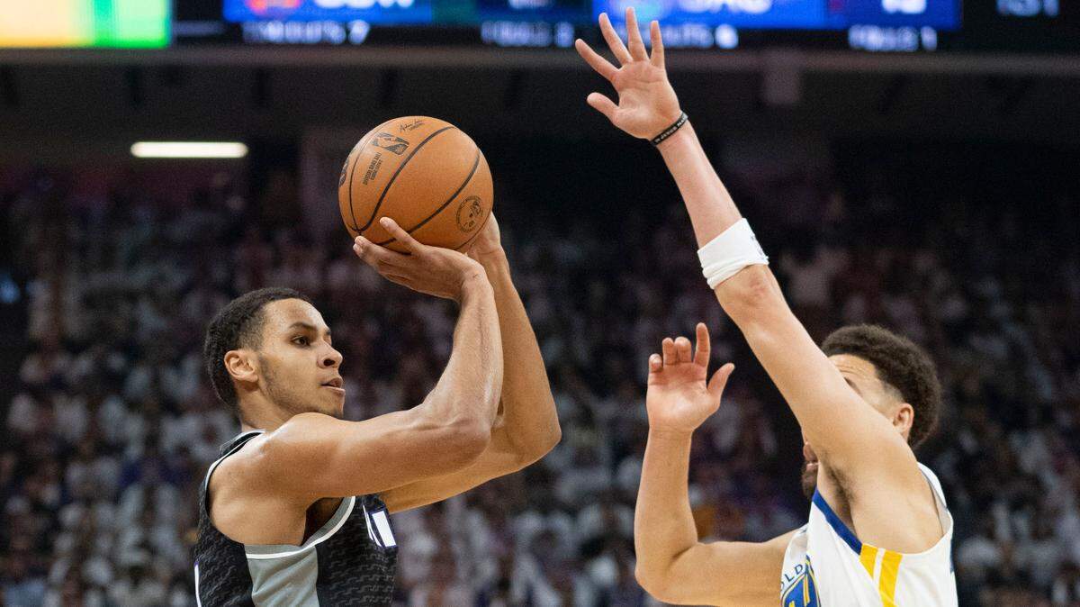 Sacramento Kings forward Keegan Murray (13) shoots the basketball against Golden State Warriors guard Klay Thompson (11) during the first quarter in Game 7 of the 2023 NBA playoffs April 23, 2023, at Golden 1 Center in Sacramento.