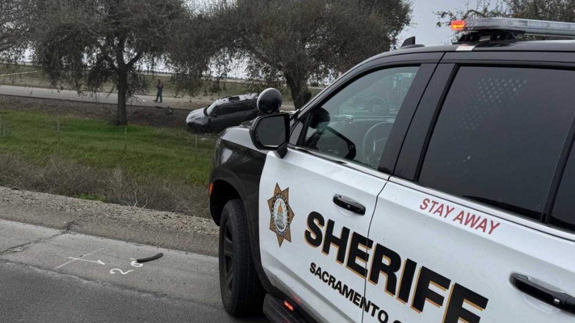 An SUV rests on the shoulder of southbound Interstate 5 west of Lodi on Tuesday following a pursuit and officer-involved shooting. Authorities shot a man suspected of fatally stabbing his son after a high-speed chase that ended near Highway 12, according to the Sacramento County Sheriff’s Office.