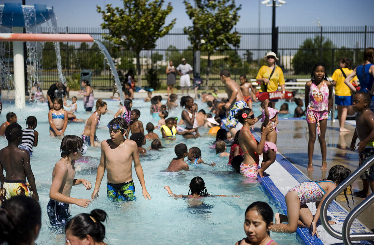 The Pannell-Meadowview Recreation Pool in south Sacramento is packed with people on a hot summer day in 2010.