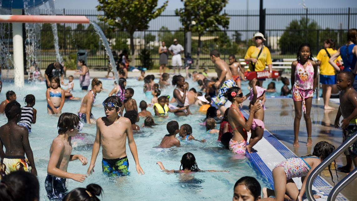 The Pannell-Meadowview Recreation Pool in south Sacramento is packed with people on a hot summer day in 2010.