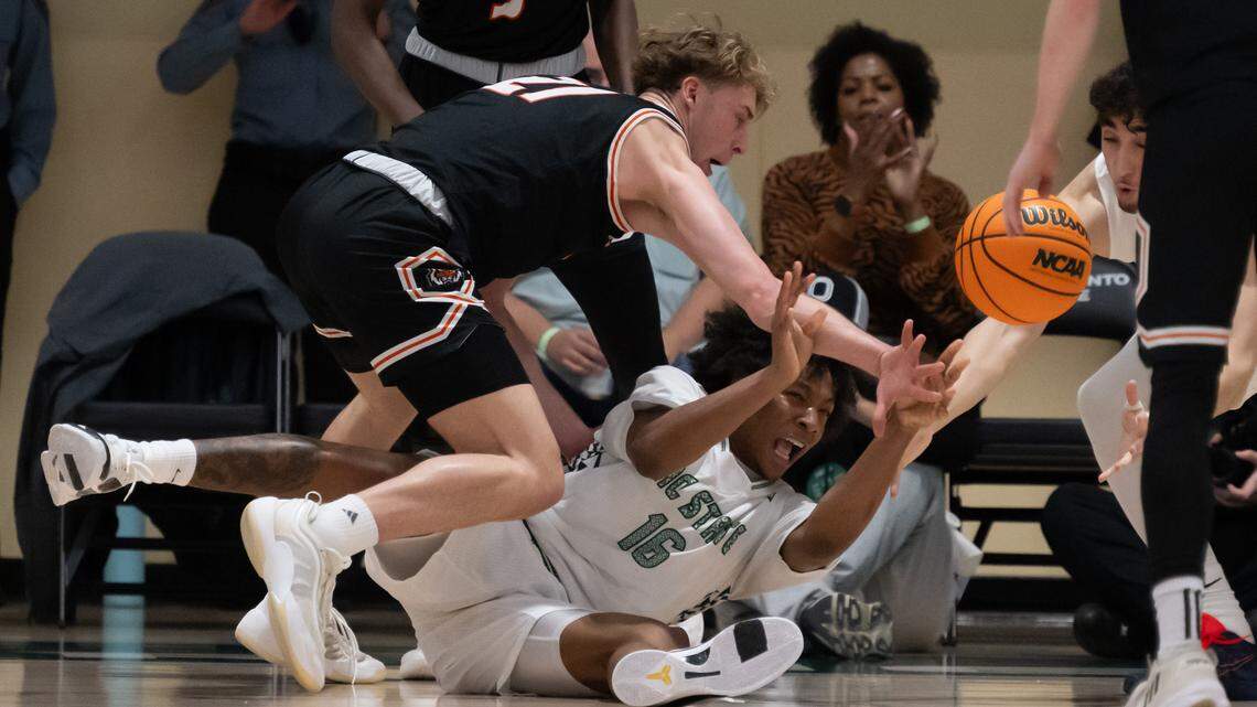 Sacramento State Hornets guard Prophet Johnson battles Idaho State Bengals guard Quin Patterson for the ball during a game at Sacramento State on Monday.