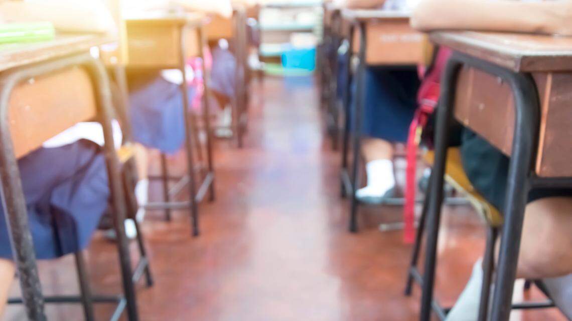 The classroom blur,Test the potential of students by taking exams, children are very intent on, exams are placed on the table, pencil handles with black eraser blocks placed.