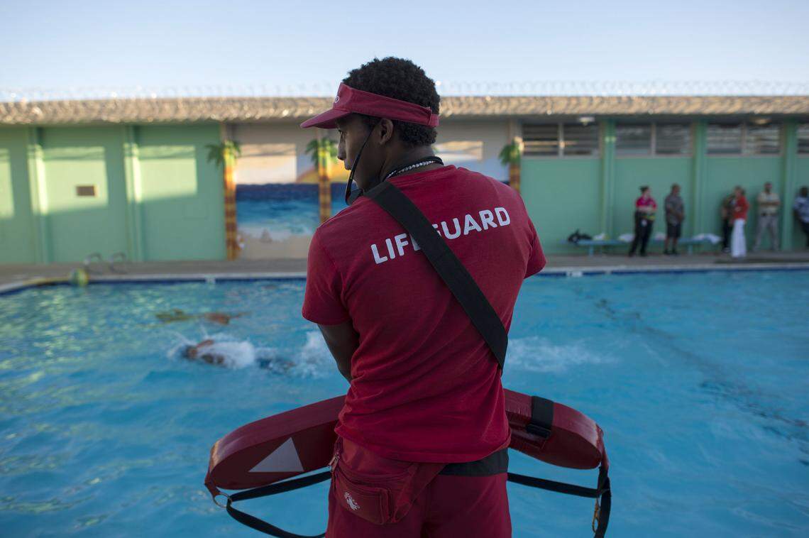 A lifeguard watches inmates swim at the Sacramento Probation Youth Detention Facility in Rosemont in 2015. The probation department is making an effort to give swim lessons and programming to juveniles  detained in the facility.
