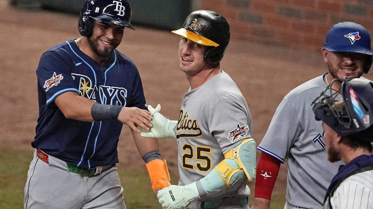 Jul 15, 2025; Cumberland, Georgia, USA; National League designated hitter Brent Rooker (25) of the Athletics hits a three run home run during the seventh inning during the 2025 MLB All Star Game at Truist Park. Mandatory Credit: Dale Zanine-Imagn Images