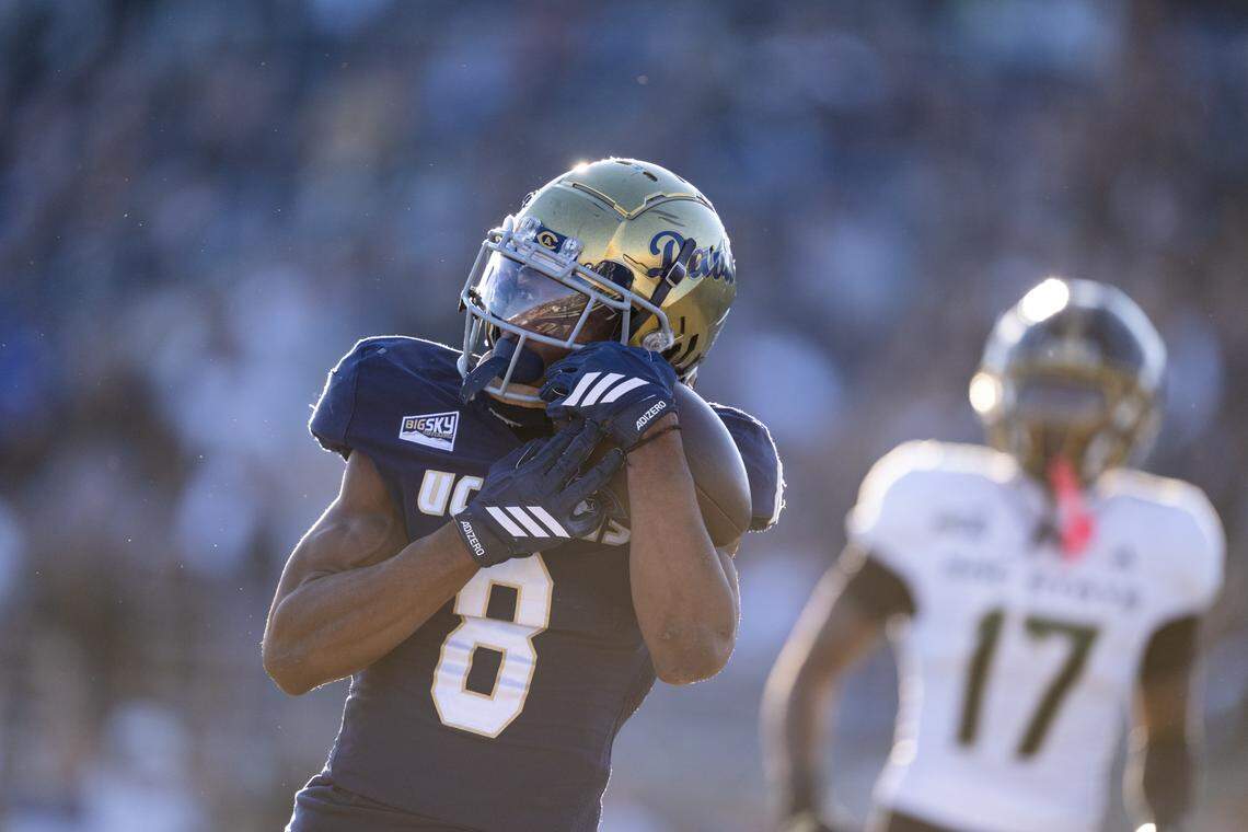 UC Davis Aggies wide receiver Samuel Gbatu Jr. (8) catches the go ahead touchdown in the fourth quarter against the Sacramento State Hornets the Causeway Classic on Saturday, Nov. 22, 2025 in Davis.
