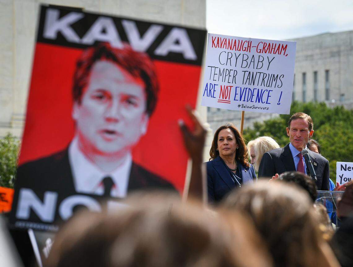 Then-Sen. Kamala&nbsp;Harris and Sen. Richard Blumenthal, D-Conn., speak to protesters gathered at the U.S. Supreme Court in 2018, ahead of a Senate Judiciary Committee vote on Brett Kavanaugh’s nomination to the court. Harris questioned Kavanaugh relentlessly during the hearings. 