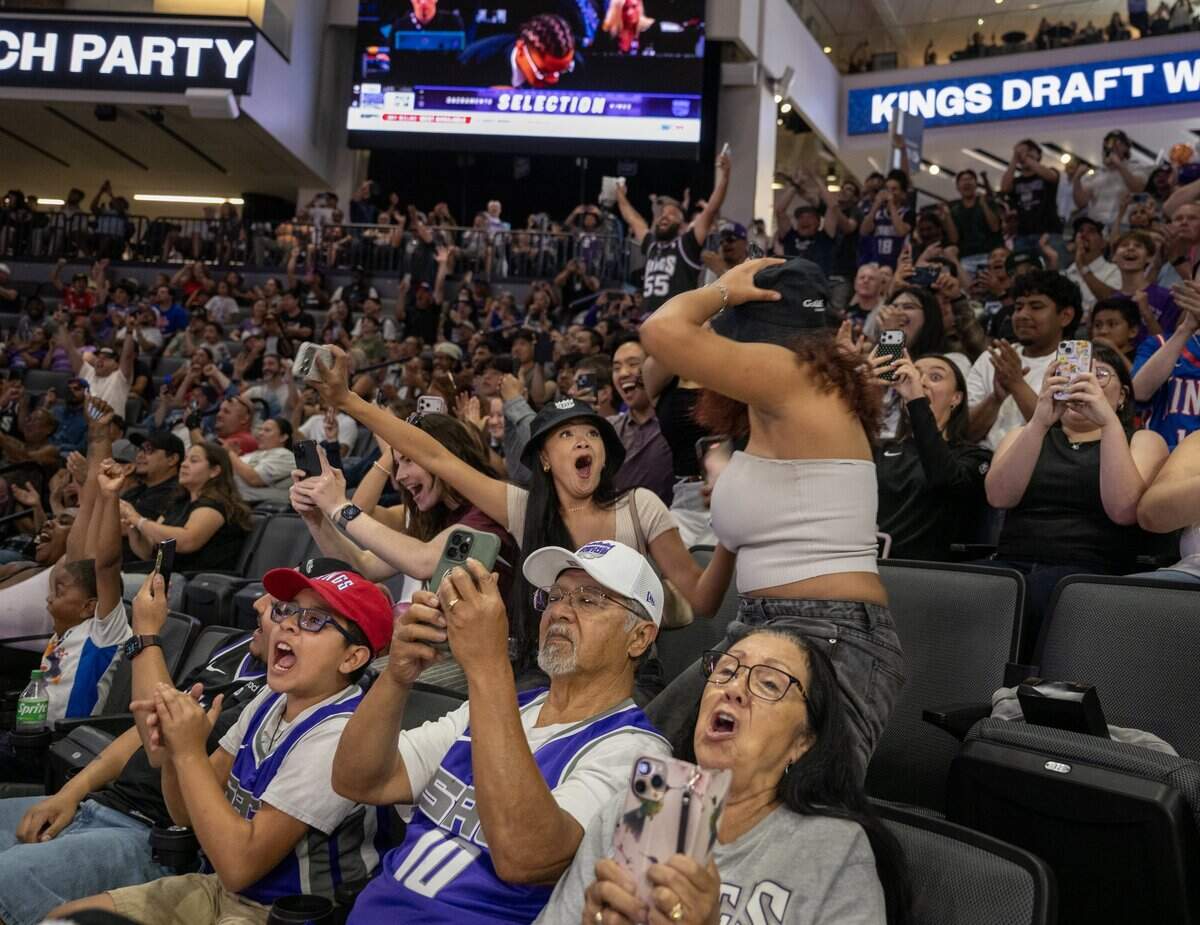 Fans react after the Sacramento Kings selected Darius Acuff Jr. on Tuesday at Golden 1 Center.