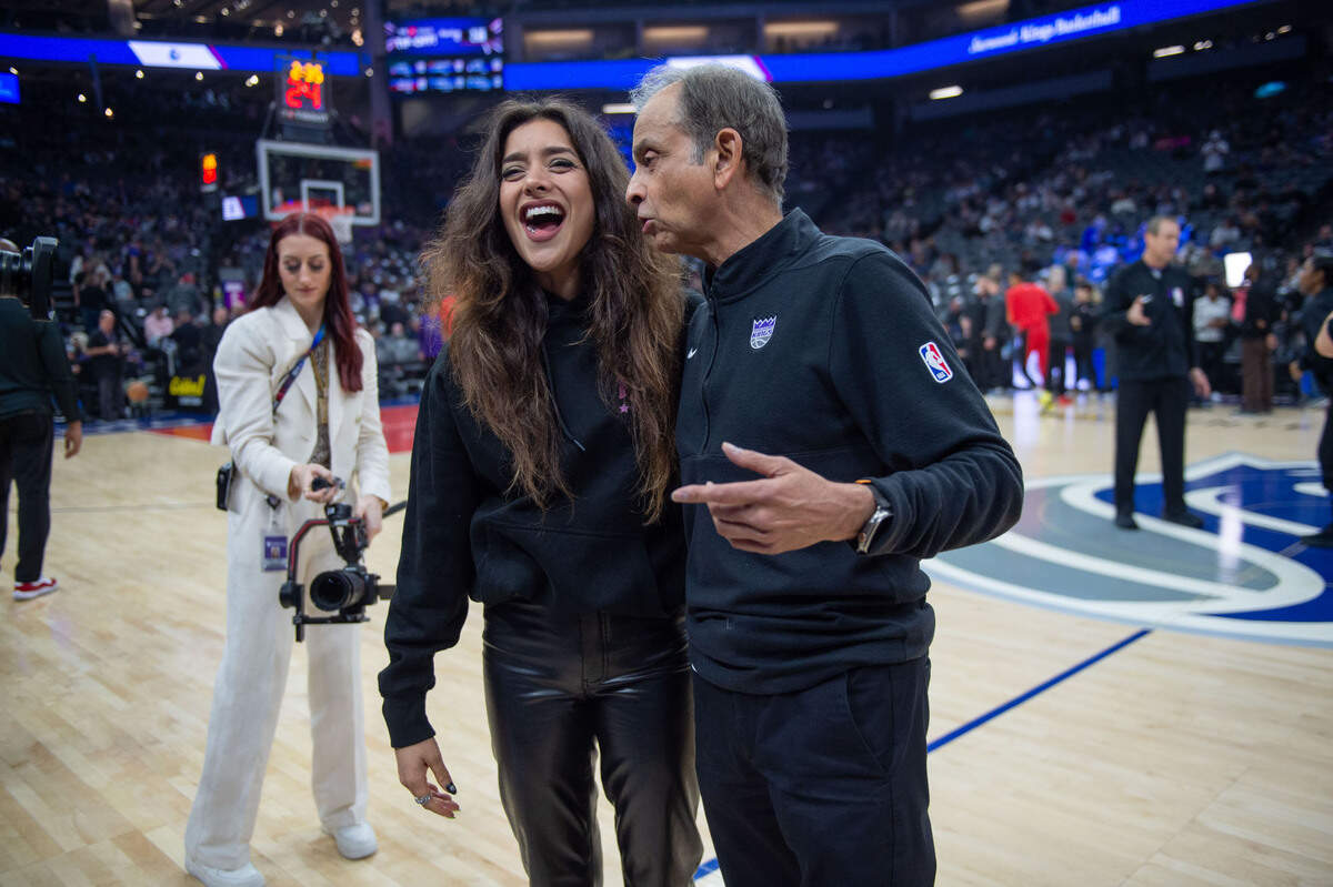 Anjali Ranadive and her father, Kings majority owner Vivek Ranadive, share a moment during an NBA game between the Sacramento Kings and the Atlanta Hawks on Monday, Jan. 22, 2024 at Golden 1 Center.
