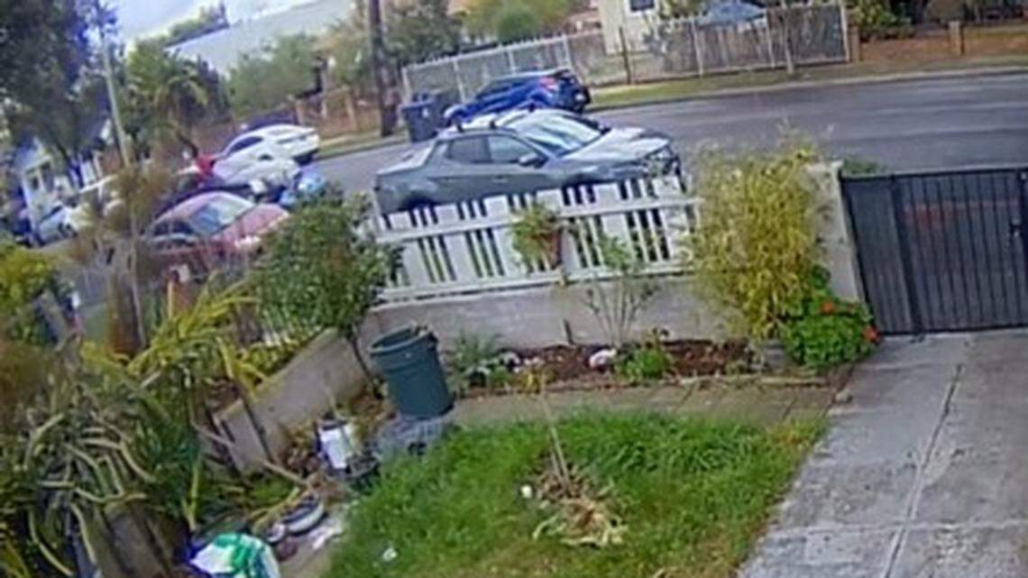 A video shows a car striking a child crossing a Santa Ana street, flipping him through the air, before fleeing, California police say.