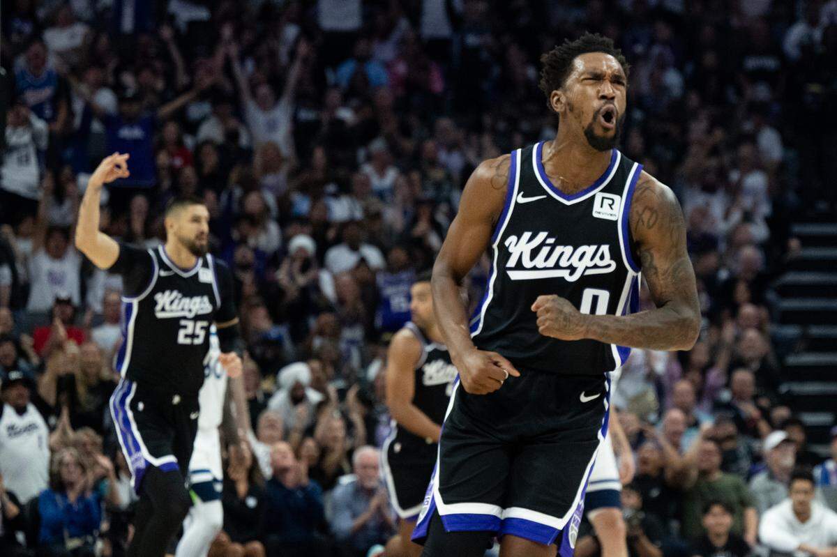 Sacramento Kings guard Malik Monk (0) reacts after scoring against the Minnesota Timberwolves during the season opener at Golden 1 Center on Thursday, Oct. 24, 2024.