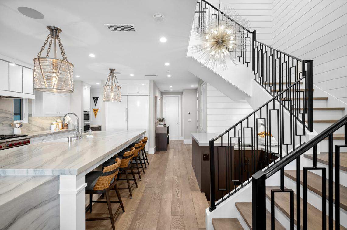 A striking Cape Cod-inspired bayfront home in California with panoramic water views has been listed for $13.5 million.