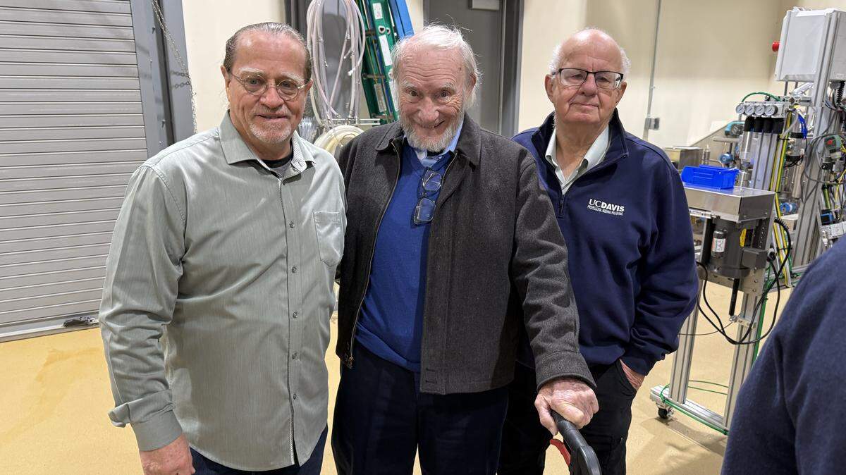 From left, Glen Fox, Michael Lewis and Charlie Bamforth gather at the UC Davis pilot brewery on Thursday, Dec. 11, 2025. The reunion marked a celebration of Lewis, who founded the Master Brewers Certificate Program in 1964.