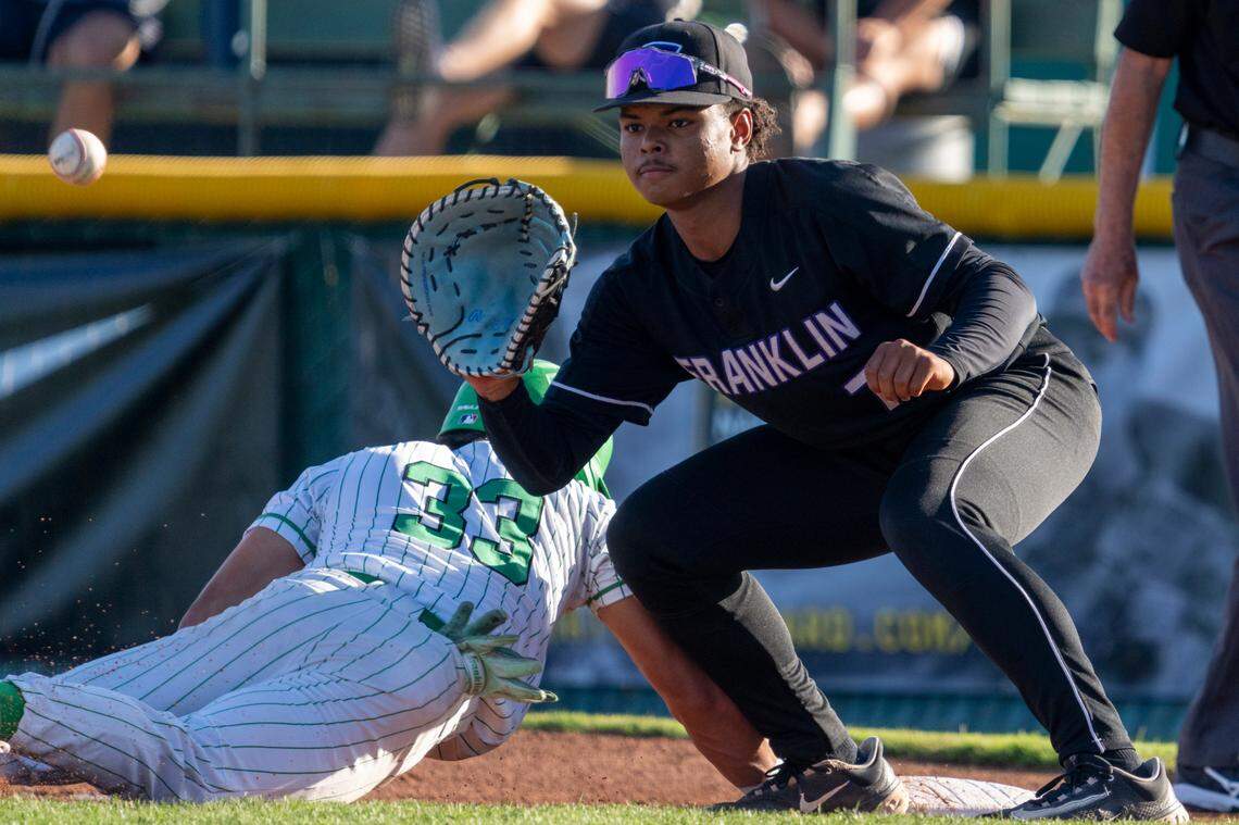 The Franklin High School Wildcats’ Dylan Minnatee catches the ball on a throwback to first during the CIF Sac-Joaquin Section Division I baseball championship game at Sacramento City College against the St. Mary’s Rams of Stockton on Friday, May 23, 2025.