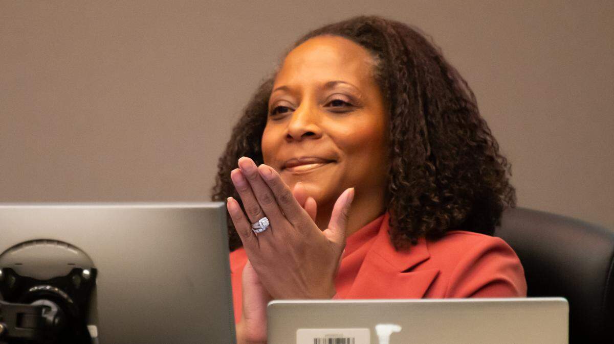 Sacramento City Manager Maraskeshia Smith applauds during a City Council meeting in January. 