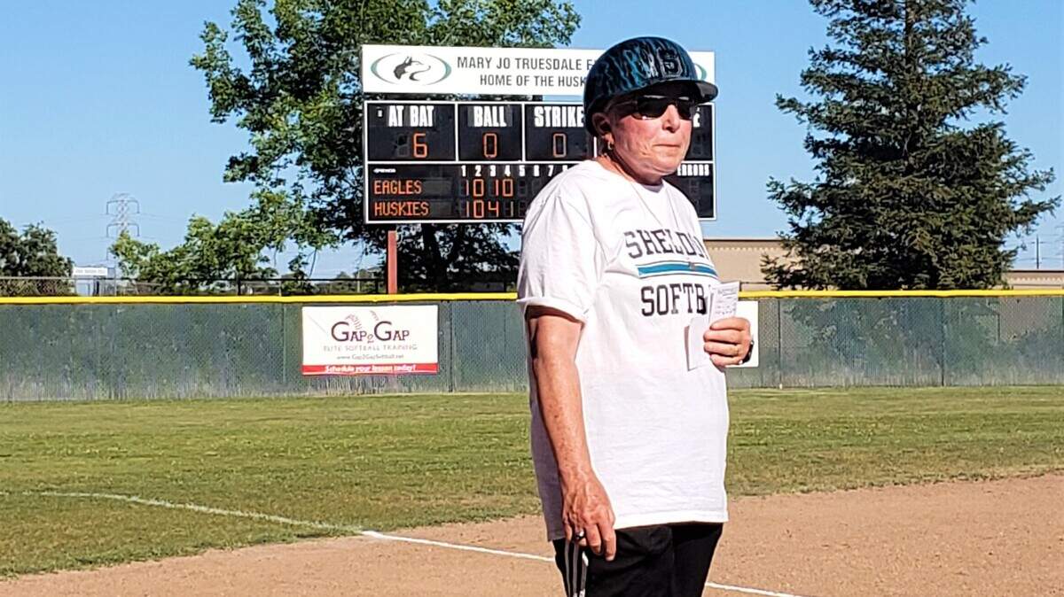 Sheldon’s Mary Jo Truesdale coaches at third base during the Huskies’ 8-2 win over Vista Del Lago on Friday, May 13, 2022.