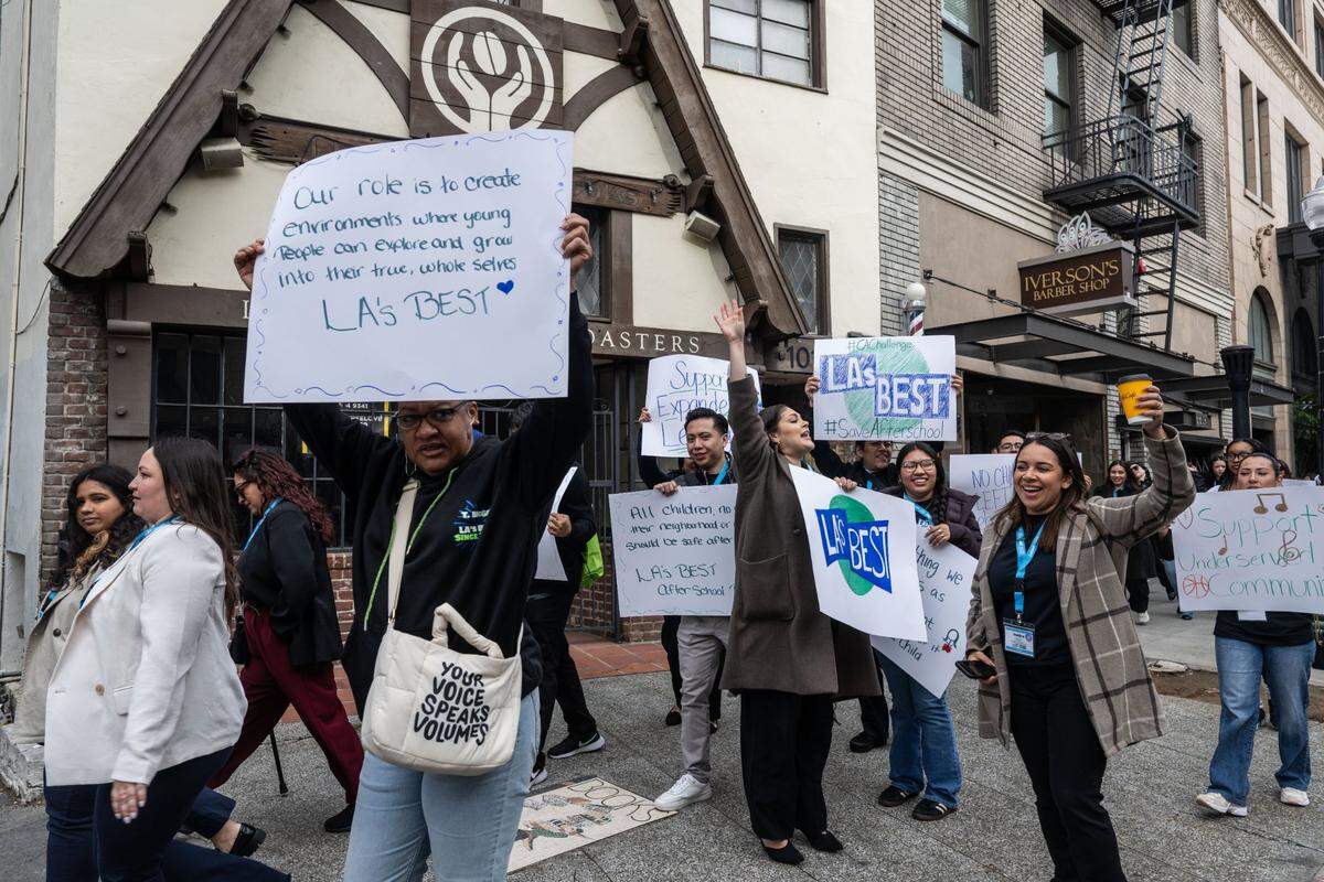 Marchers call for funding for afterschool programs, which are threatened by President Trump’s plans to dismantle the U.S. Department of Education, as they walk from Cesar Chavez Plaza to the state Capitol on 10th Street in Sacramento on Tuesday.