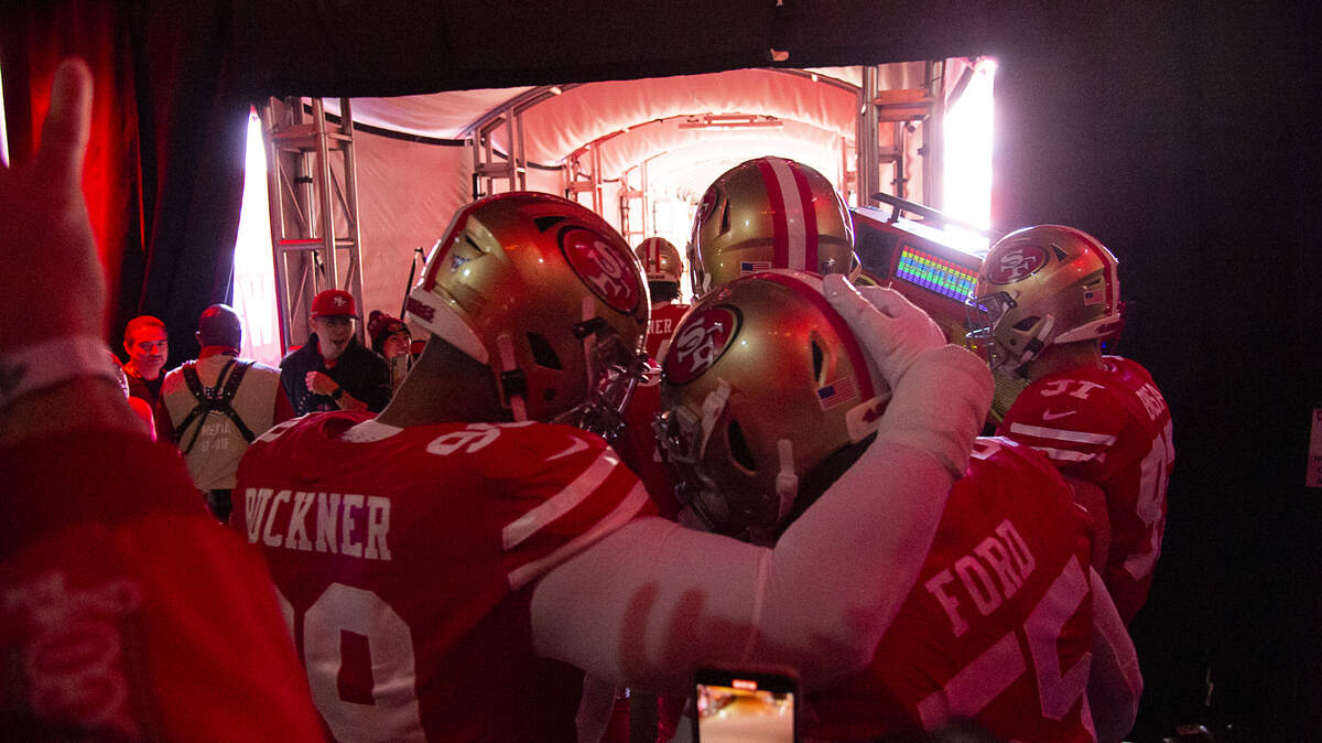 San Francisco 49ers defensive tackle DeForest Buckner (99) hugs San Francisco 49ers defensive end Dee Ford (55) before the start of an NFC playoff game at the Levi’s Stadium on Saturday, Jan 11, 2020 in Santa Clara.