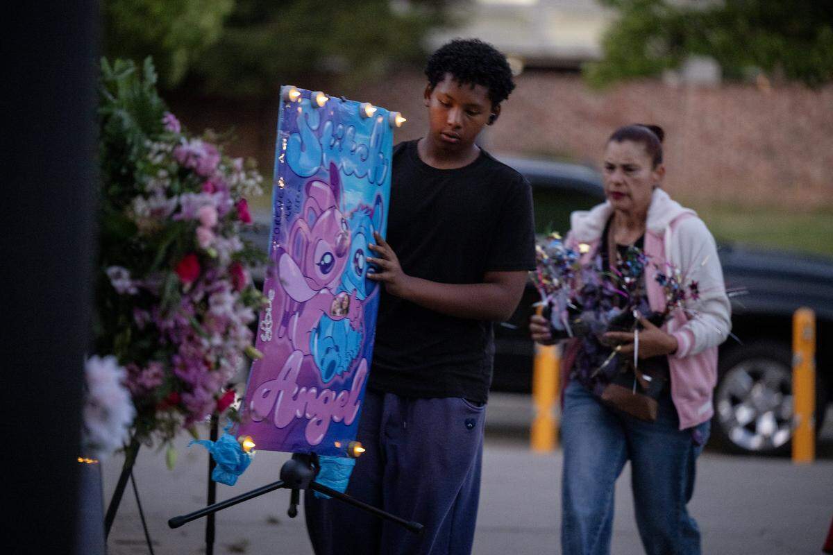 Mourners of Ariyonna Orozco, 16, and Piper Conkling, 14, who died in the fiery crash near Rancho Murieta, attend a candlelight vigil at North Laguna Creek Park in Sacramento on Friday.