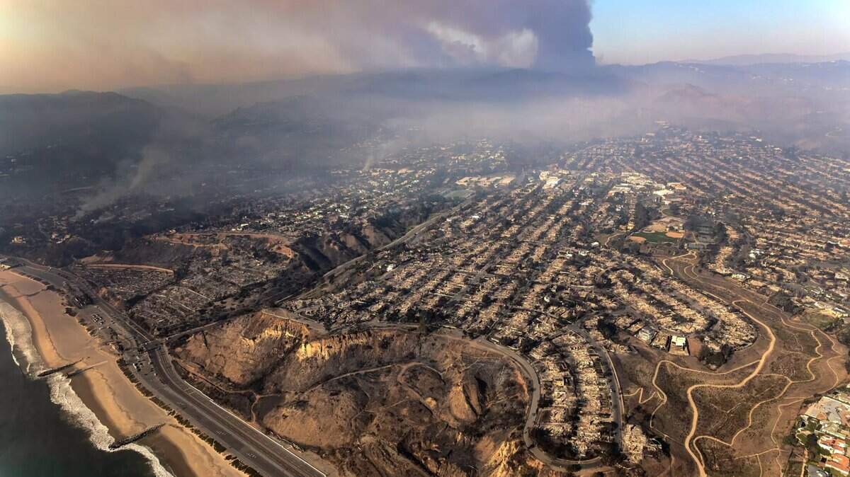The devastation from the Palisades Fire, seen by air on Thursday, Jan. 9, 2025, extends for miles.