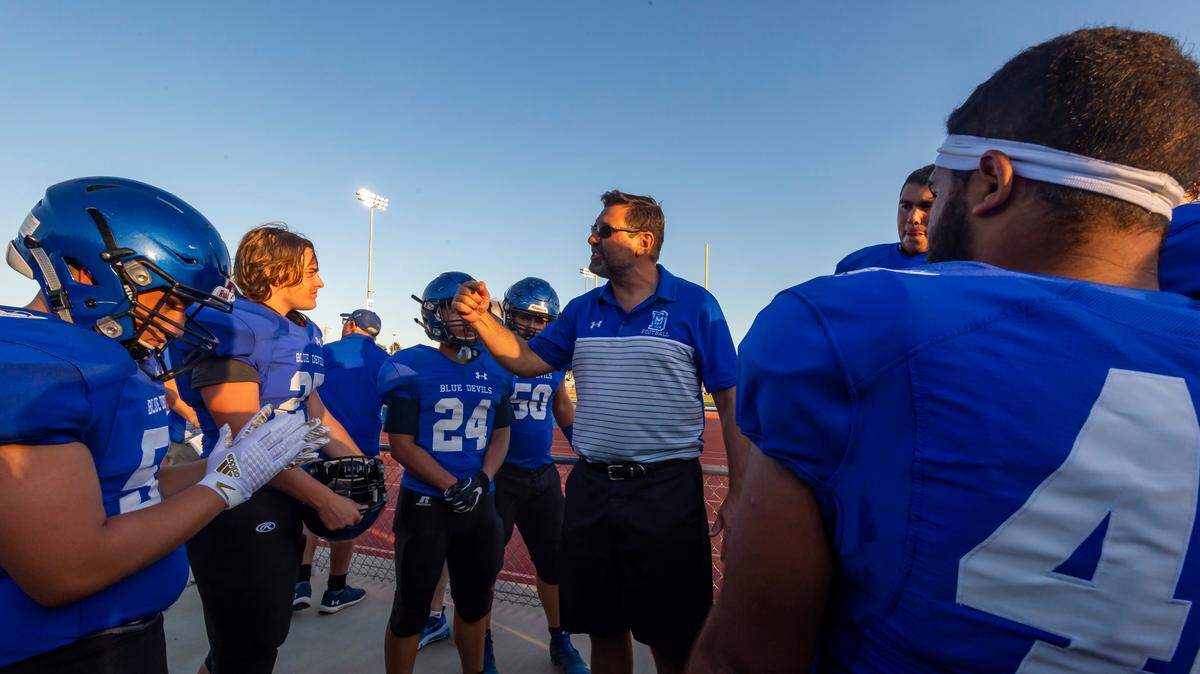 Davis High football coach Steve Smyte looks to lead the Blue Devils to their first playoff win in 24 years.