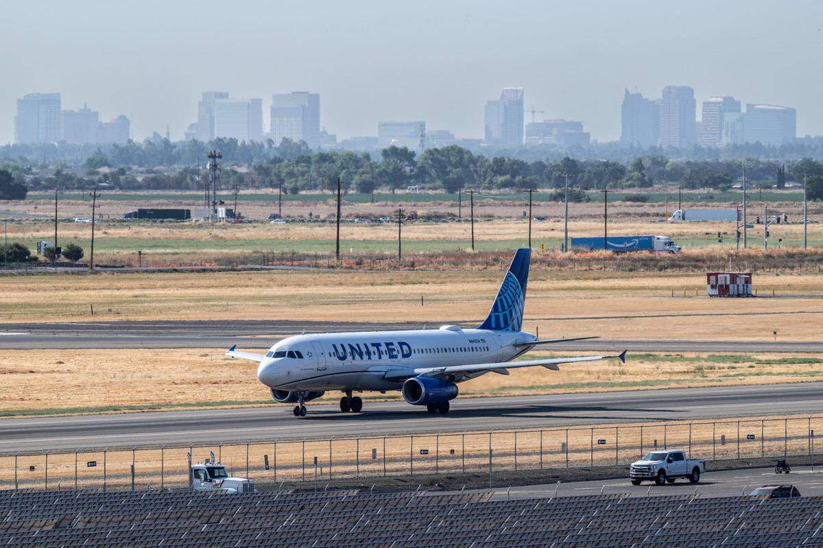 A United Airlines flight makes its way to the terminal after landing after a global technology outage on Friday, July 19, 2024, that forced some airlines to cancel flights.
