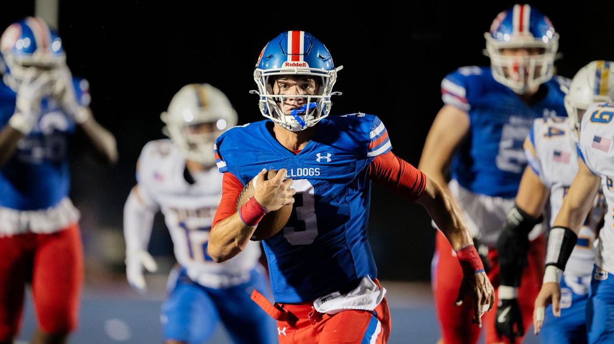 Folsom Bulldogs quarterback Ryder Lyons, (3) runs for a touchdown against the Serra Padres in the first quarter on Friday, Aug. 30, 2024, at Folsom High School.