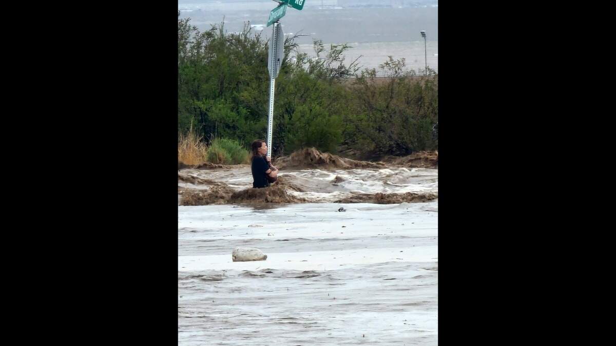 A 42-year-old woman was found clinging to a stop sign on July 25, 2022, in Golden Valley, Arizona. She was trapped in rushing floodwaters.