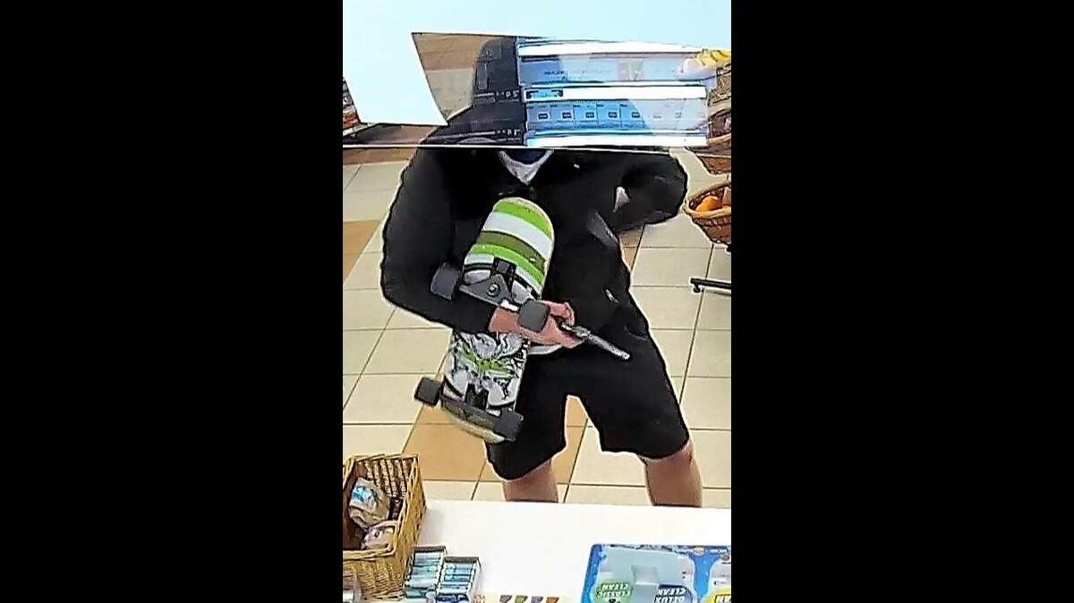 Elk Grove police seek a robbery suspect caught on camera Monday, July 8, 2019, at an AM/PM convenience store on Harbour Point Drive.