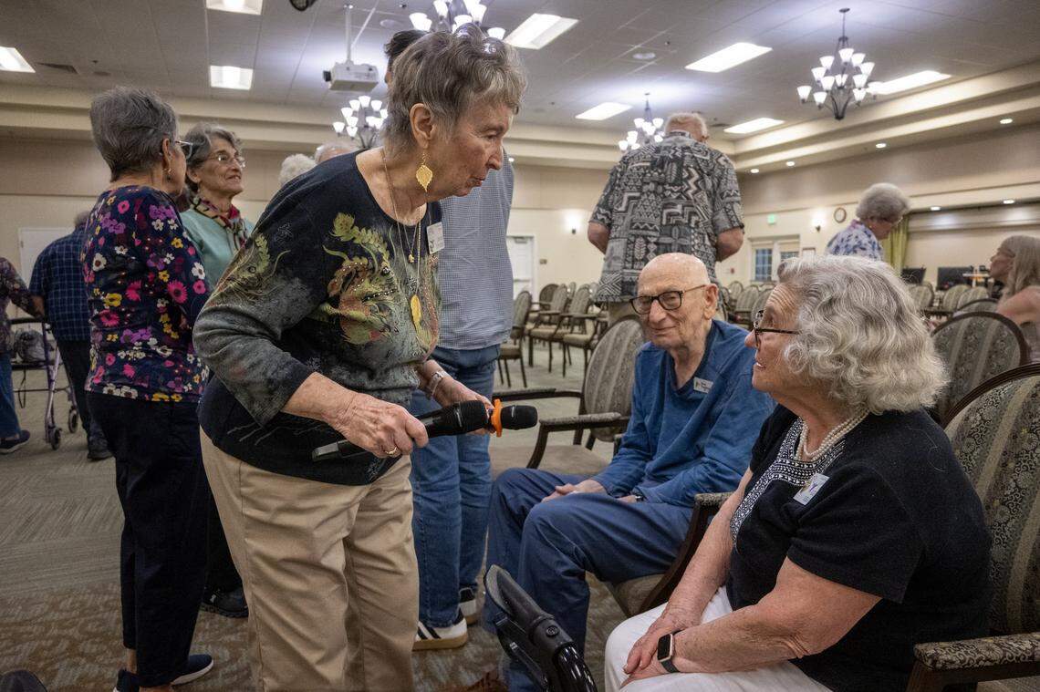 Liz Igra, a Holocaust survivor talks with Joan Unter following her presentation describing her experience during the Holocaust at Eskaton Village in Carmichael on Tuesday, March 24, 2026.