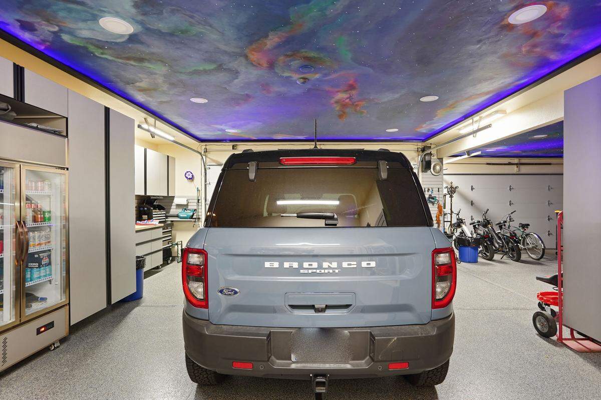 The garage has murals and a mesmerizing fiber-optic display of the night sky with twinkling stars.